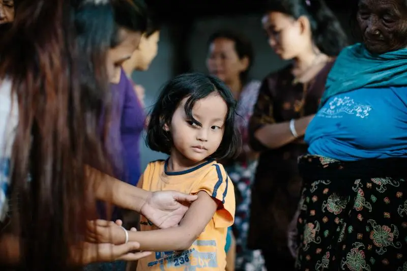Little girl showing her arm Little girl showing her arm, leprosy post exposure prophylaxis program